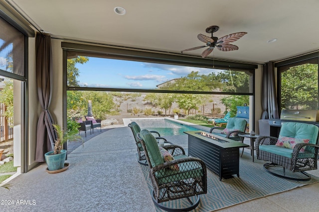 view of patio / terrace featuring a fenced in pool, ceiling fan, and outdoor lounge area