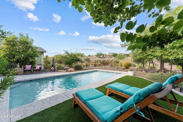 view of swimming pool with a patio