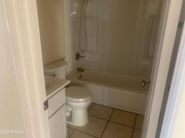 bathroom featuring vanity, tile patterned floors, toilet, and bathtub / shower combination