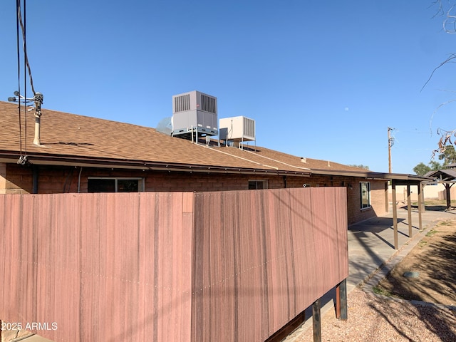 view of yard featuring cooling unit and a patio area