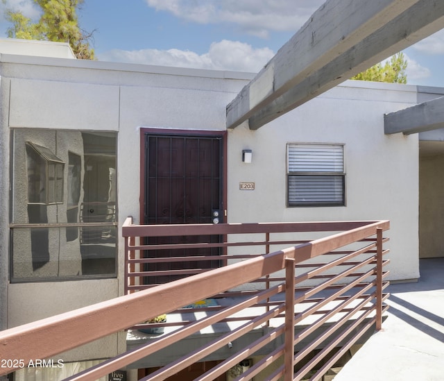 3330 W Danbury Dr Unit E203, Phoenix, AZ 85053 - doorway to property featuring stucco siding