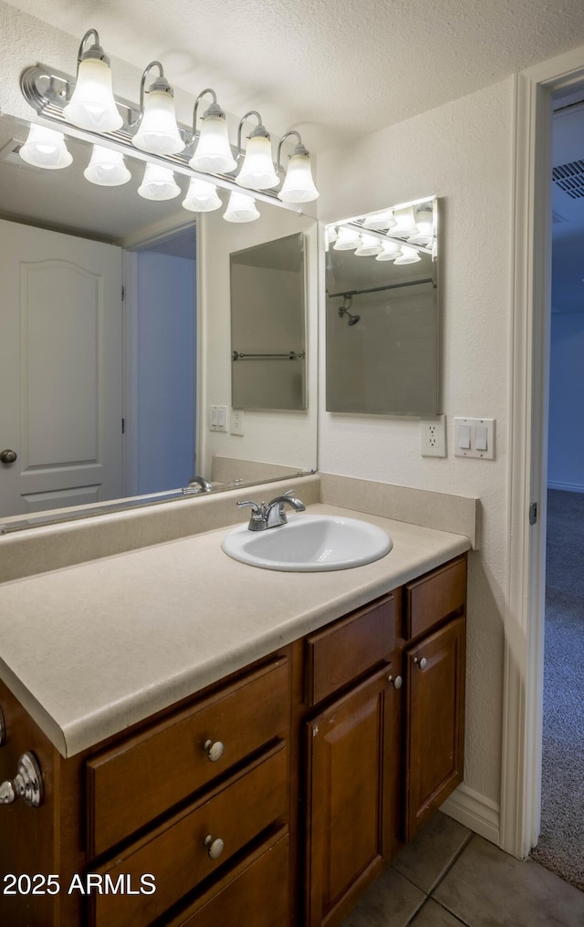 3330 W Danbury Dr Unit E203, Phoenix, AZ 85053 - bathroom with vanity and tile patterned flooring