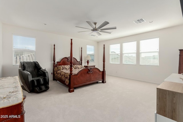 bedroom featuring ceiling fan and light colored carpet