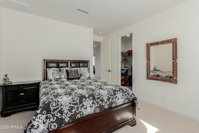 bedroom with light colored carpet