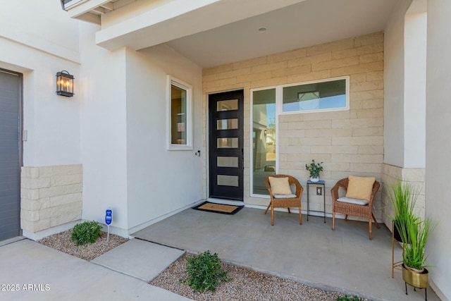 property entrance featuring a porch