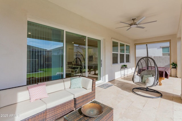 view of patio / terrace featuring ceiling fan and an outdoor hangout area