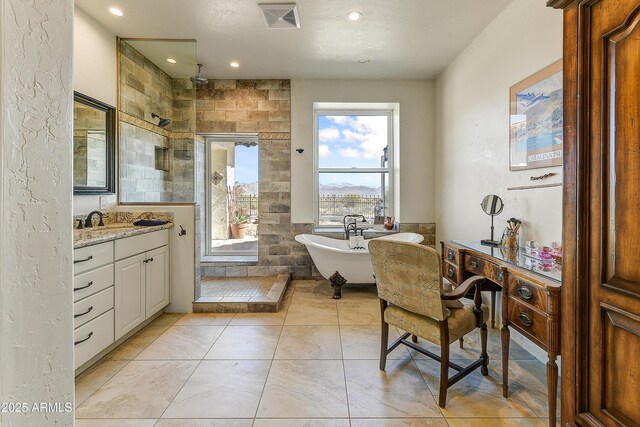 full bathroom with visible vents, a tile shower, recessed lighting, a freestanding bath, and vanity