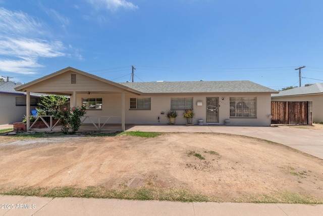 3617 W Luke Ave, Phoenix, AZ 85019 - ranch-style home with brick siding, a shingled roof, and fence