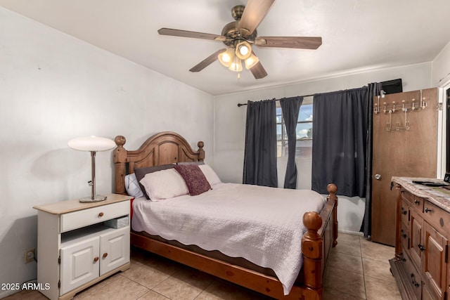 3617 W Luke Ave, Phoenix, AZ 85019 - bedroom with a ceiling fan and light tile patterned flooring