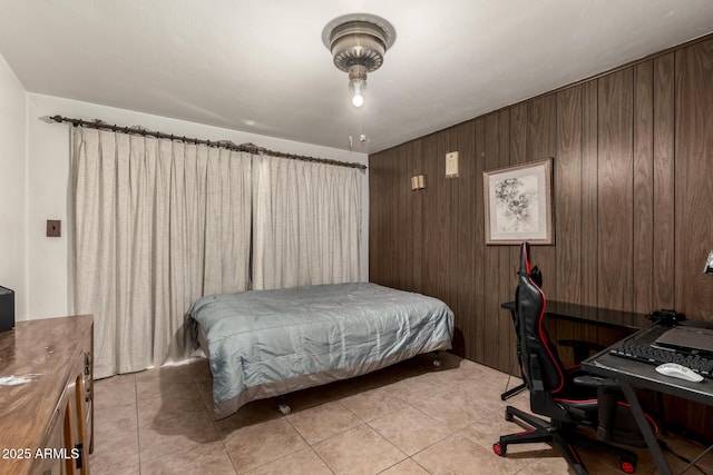 3617 W Luke Ave, Phoenix, AZ 85019 - bedroom with wood walls and light tile patterned flooring