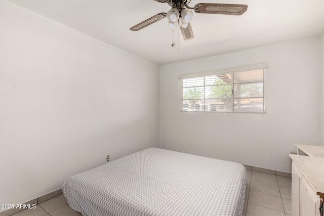 3617 W Luke Ave, Phoenix, AZ 85019 - bedroom featuring ceiling fan and light tile patterned flooring