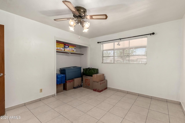 3617 W Luke Ave, Phoenix, AZ 85019 - empty room featuring light tile patterned floors, ceiling fan, and baseboards