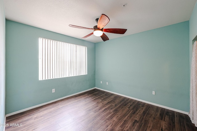 5401 E Van Buren St Unit 2095, Phoenix, AZ 85008 - empty room featuring ceiling fan, baseboards, and wood finished floors