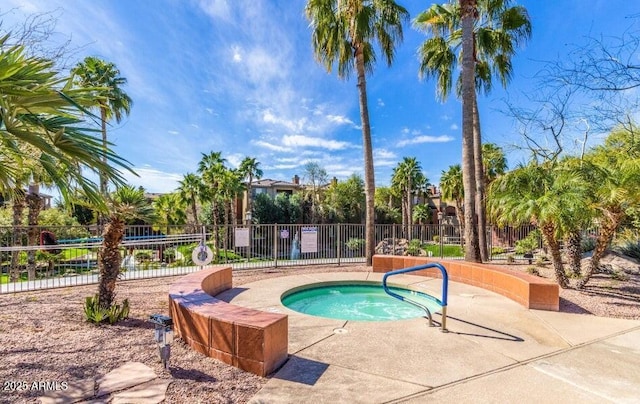 5401 E Van Buren St Unit 2095, Phoenix, AZ 85008 - view of pool featuring fence and a hot tub