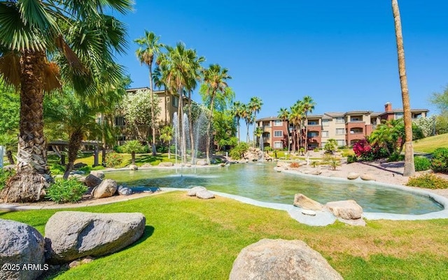 5401 E Van Buren St Unit 2095, Phoenix, AZ 85008 - view of community with a yard