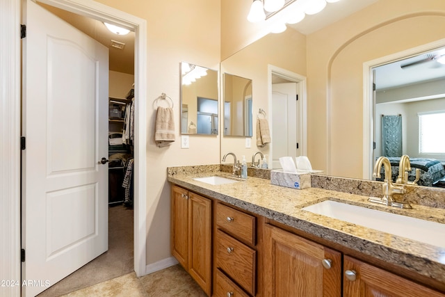 bathroom featuring tile patterned floors and vanity