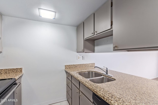 kitchen featuring sink and light tile patterned flooring