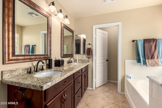 full bath with a bath, tile patterned flooring, visible vents, and a sink