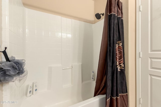 bathroom featuring shower / bath combination with curtain