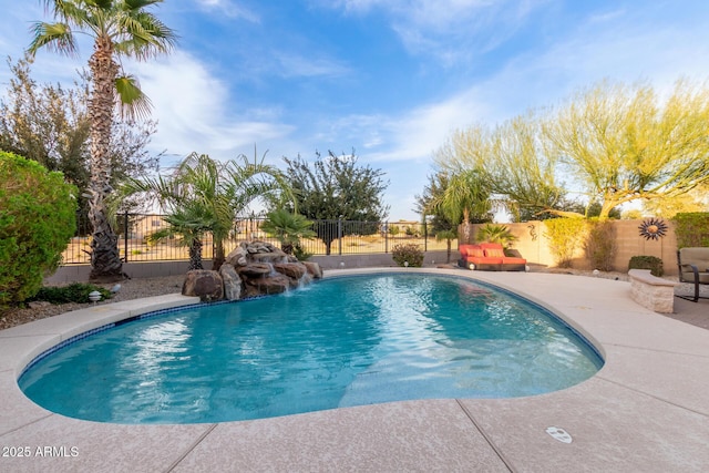 view of swimming pool with a fenced in pool, a patio area, and a fenced backyard