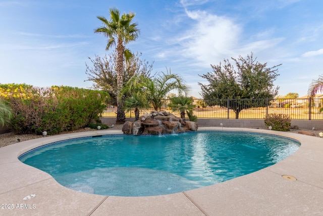 view of swimming pool featuring a fenced backyard and a fenced in pool