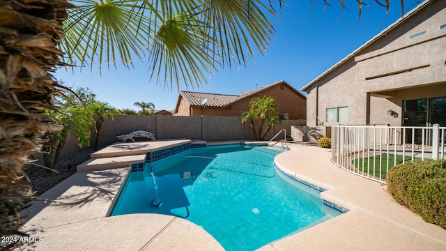 view of swimming pool featuring a patio