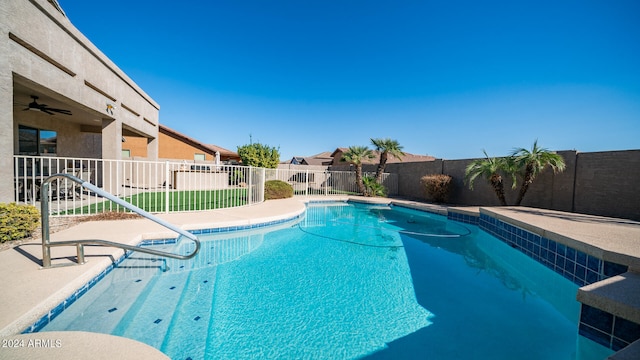 view of pool with ceiling fan