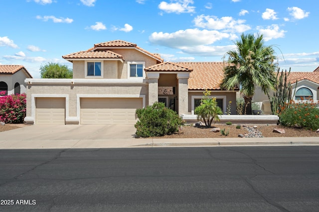 4002 N San Gabriel Cir, Mesa, AZ 85215 - mediterranean / spanish-style home with stucco siding, concrete driveway, and a tile roof