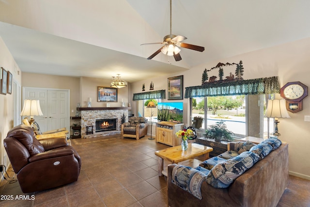 4002 N San Gabriel Cir, Mesa, AZ 85215 - living area featuring ceiling fan, dark tile patterned floors, and a fireplace