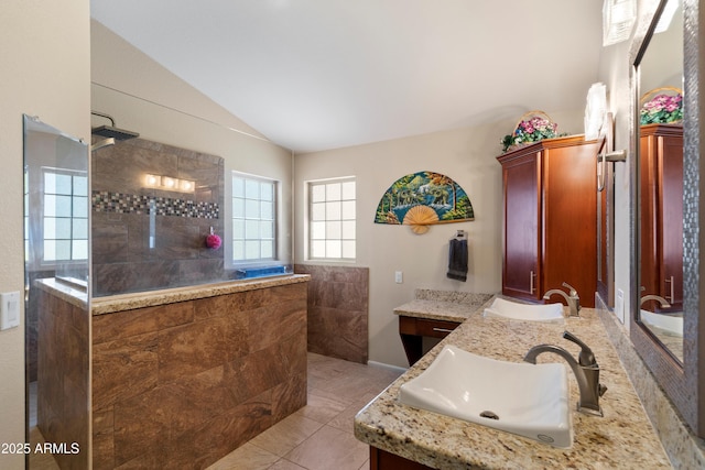 4002 N San Gabriel Cir, Mesa, AZ 85215 - bathroom with double vanity, walk in shower, vaulted ceiling, and tile patterned flooring