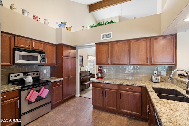 4002 N San Gabriel Cir, Mesa, AZ 85215 - kitchen featuring stainless steel appliances, high vaulted ceiling, tasteful backsplash, beam ceiling, and tile patterned flooring