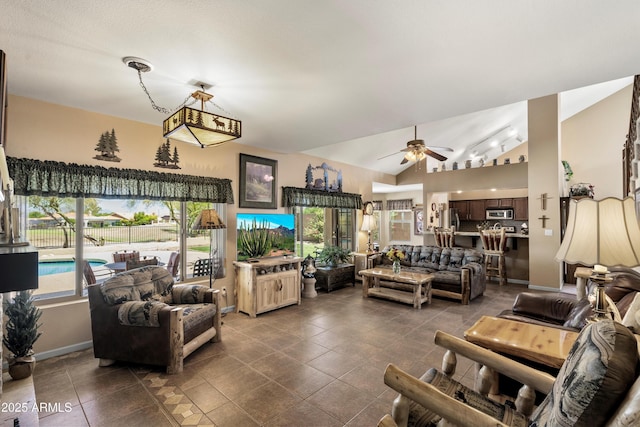 4002 N San Gabriel Cir, Mesa, AZ 85215 - living area featuring ceiling fan, dark tile patterned flooring, and lofted ceiling