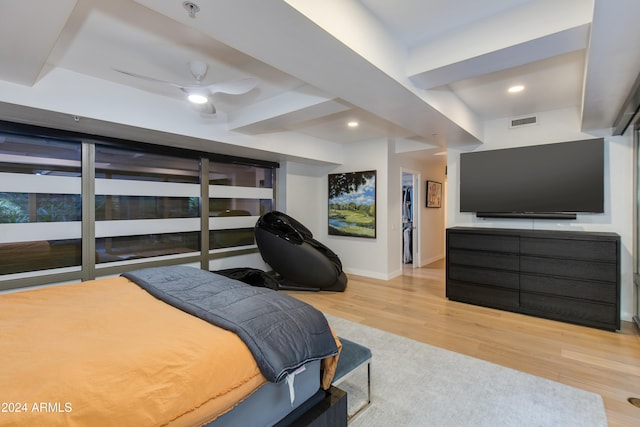 bedroom with hardwood / wood-style flooring and ceiling fan