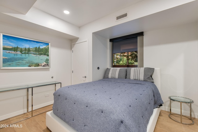 bedroom featuring light hardwood / wood-style floors