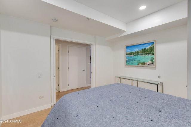 unfurnished bedroom featuring hardwood / wood-style flooring