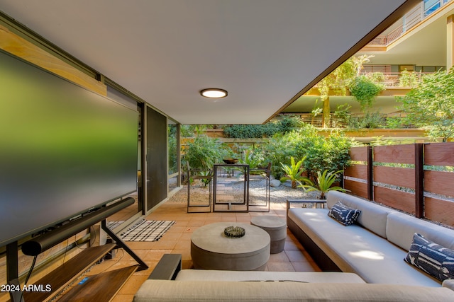 balcony featuring an outdoor hangout area and a patio