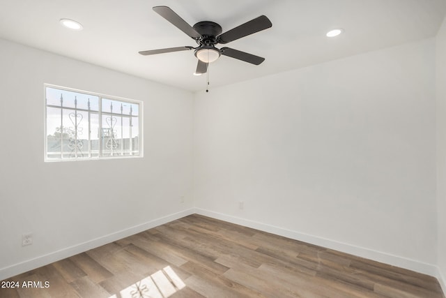 unfurnished room with light hardwood / wood-style floors and ceiling fan