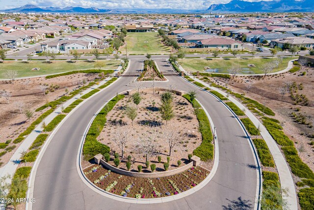 birds eye view of property featuring a mountain view