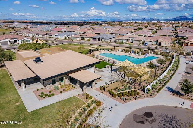 birds eye view of property featuring a mountain view