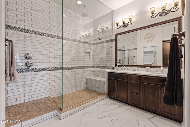 bathroom featuring vanity and tiled shower