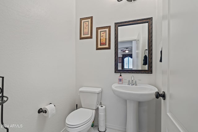 bathroom featuring toilet