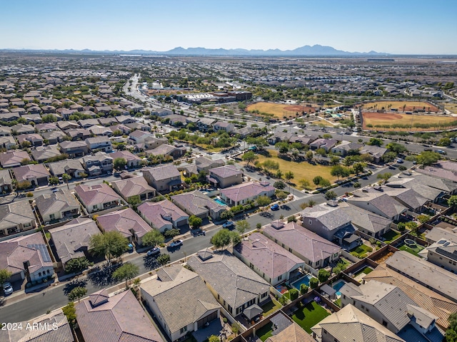 birds eye view of property featuring a mountain view