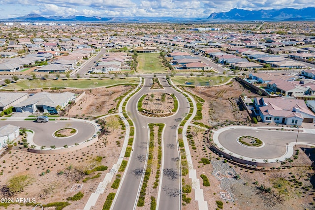 birds eye view of property featuring a mountain view