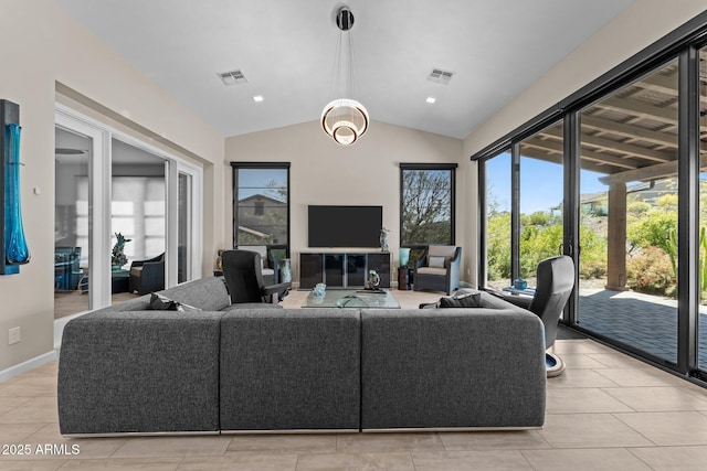 4093 Miners Gulch Way, Wickenburg, AZ 85390 - living room featuring light tile patterned floors, baseboards, lofted ceiling, and visible vents