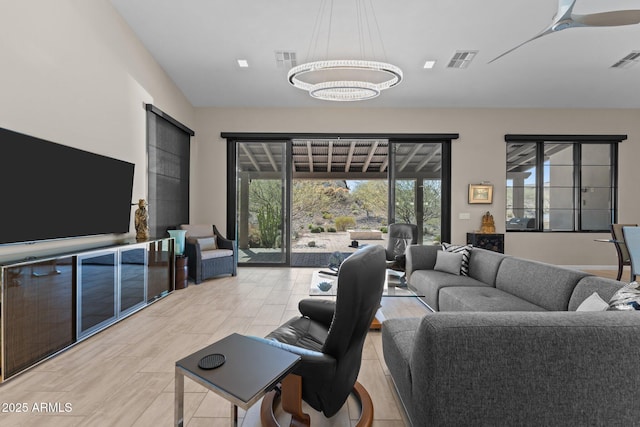 4093 Miners Gulch Way, Wickenburg, AZ 85390 - living area with a notable chandelier and visible vents