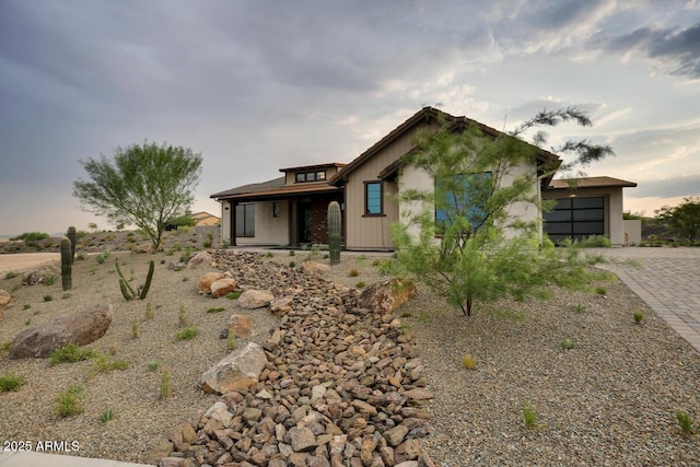 4093 Miners Gulch Way, Wickenburg, AZ 85390 - view of front of house featuring decorative driveway and a garage