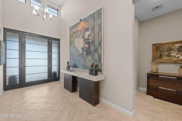 4093 Miners Gulch Way, Wickenburg, AZ 85390 - home office with baseboards, a high ceiling, visible vents, and a chandelier