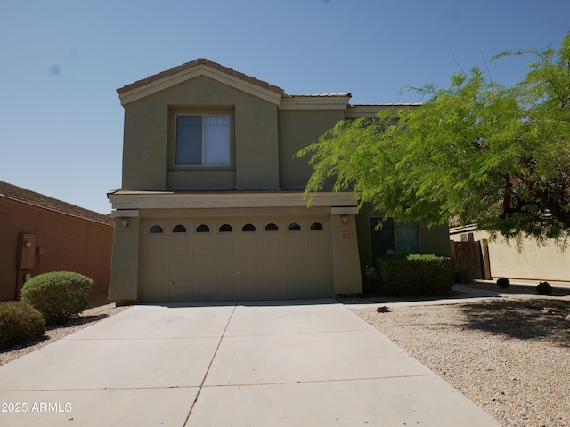 43241 W Kristal Ln, Maricopa, AZ 85138 - view of front facade featuring concrete driveway, a garage, and stucco siding
