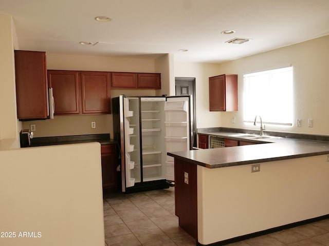 43241 W Kristal Ln, Maricopa, AZ 85138 - kitchen featuring a sink, freestanding refrigerator, dark countertops, and recessed lighting