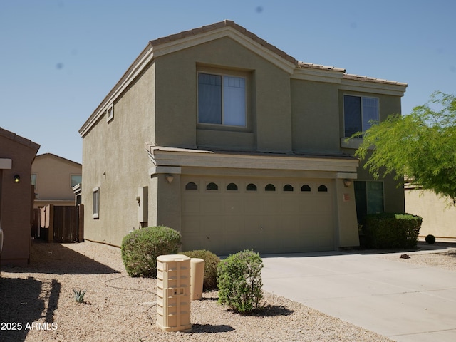 43241 W Kristal Ln, Maricopa, AZ 85138 - traditional-style home featuring a garage, stucco siding, and driveway